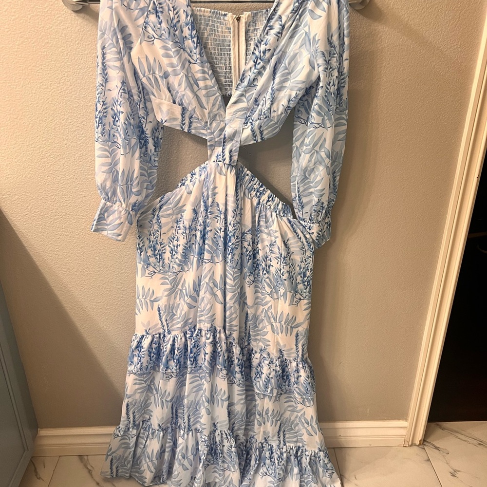 It’s a maxi dress,  light blue and white